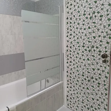 Quarto em Acomodações Particulares Casa Na *